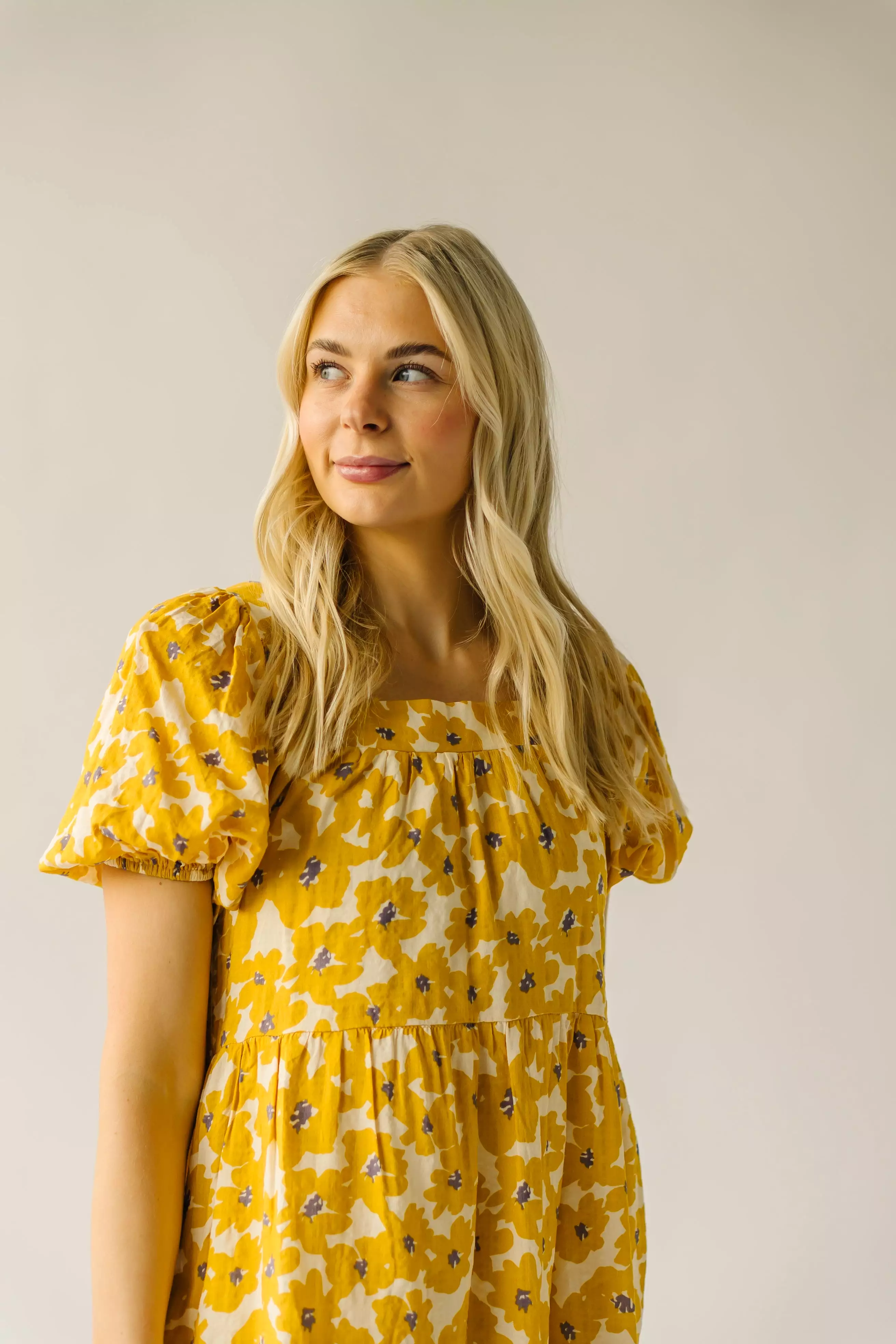 The Burwell Tiered Midi Dress in Mustard Floral