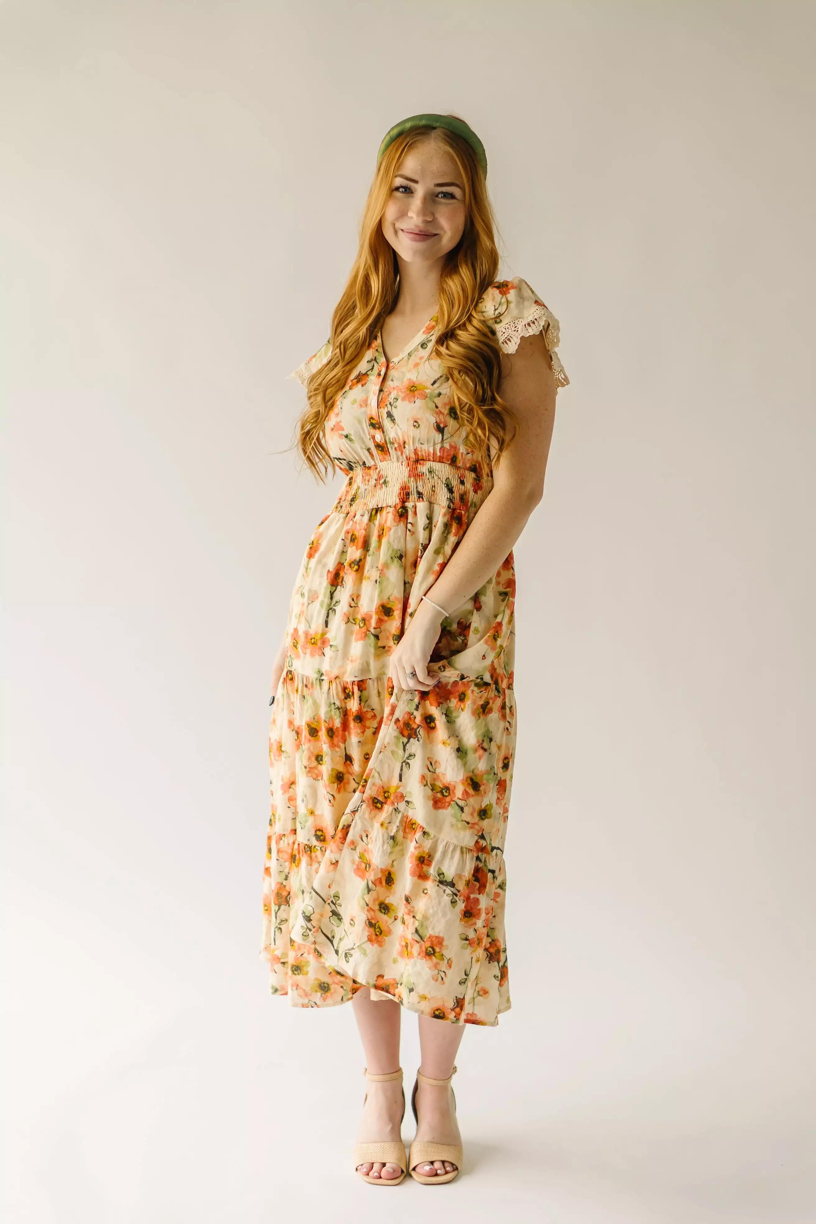 The Korenfeld Smocked Waist Midi Dress in Natural Multi