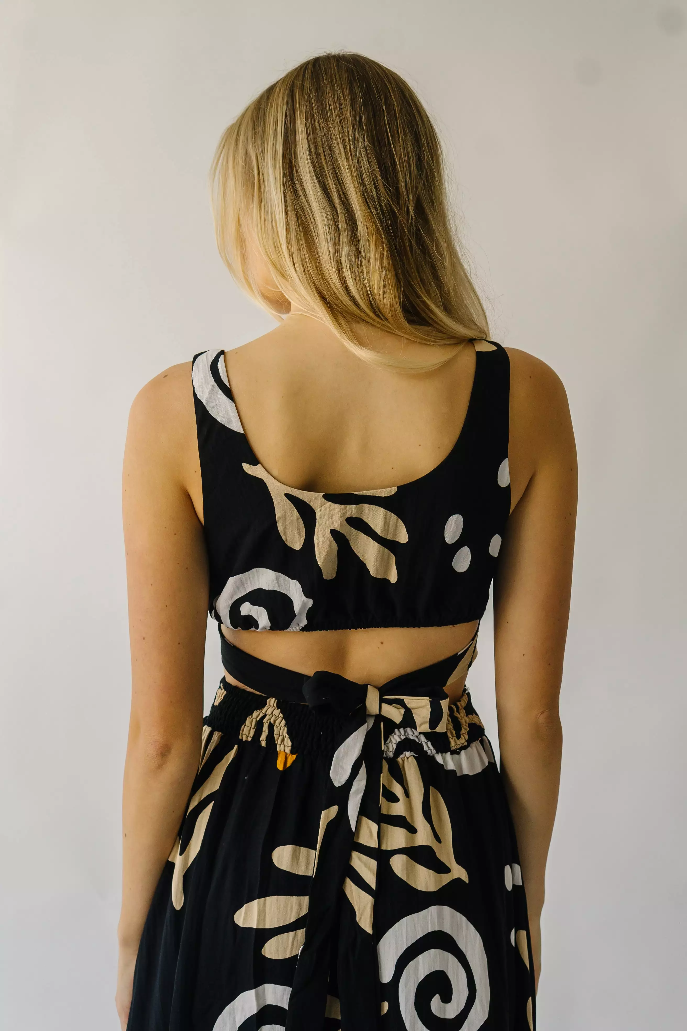 The Nunez Patterned Cutout Midi Dress in Black